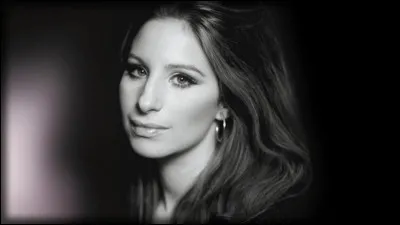 Qui a fait une reprise en français de ''Woman in Love'' de Barbra Streisand ?