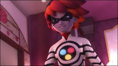 Que possède le dessinateur sur sa tête ?