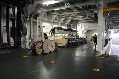 Juste après, cette partie sert de garage, de zone de stockage ou encore de salle d'atelier. Il s'agit...