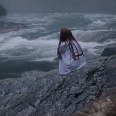 Qui retrouve Cheryl pleurant au bord de la rivière ?