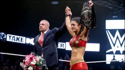 Dans quel Takeover Bayley a-t-elle &eacute;crit l'histoire avec Sasha Banks, en participant au tout premier Iron Women match f&eacute;minin, pour le titre f&eacute;minin de NXT ?