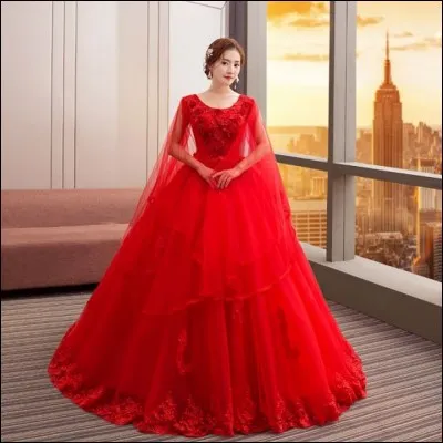 Dans quel pays, la robe de mariée est-elle traditionnellement rouge ?