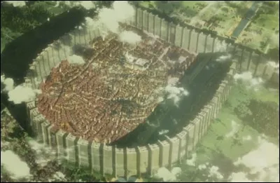 Quel est le nom du district où habitaient Eren, Armin et Mikasa ?