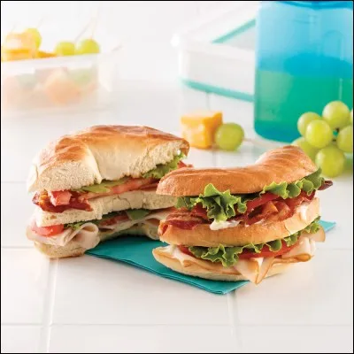 Complétez la phrase : "I am hungry, shall we  a sandwich." ?