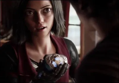 Cette personne va tomber amoureuse du garçon qui la sauve au début du film. Que voulait-elle lui donner pour prouver son amour alors qu'il refuse son cadeau ?