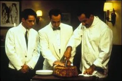 Quel célèbre chanteur américain a joué dans "À table" aux côtés de Tony Shalhoub ?