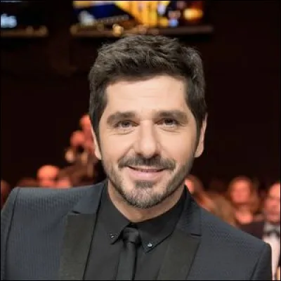 Avec qui est-il pour la première fois coach à "The Voice Kids" en 2015 ?