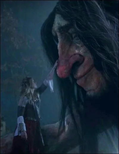 Lorsqu'Alice est en danger face aux menaces des chasseurs de troll, que fait Robin ?