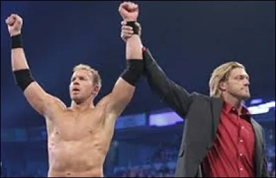 Contre qui Christian prend-il la possession pour la première fois du World Heavyweight Championship ?