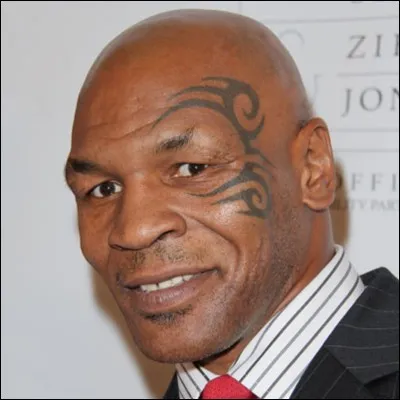 Complétez la phrase avec le verbe au passé composé de l'indicatif : "Mike Tyson  l'oreille d'Evander Holyfield" ?