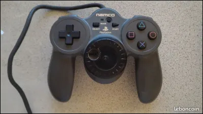 &Agrave; quoi servait le bouton central de cette manette ?
