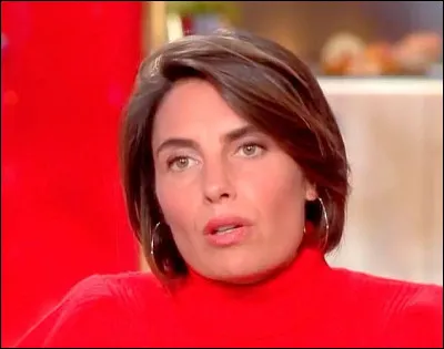 Avec qui a-t-elle présenté le Téléthon en 2009 ?