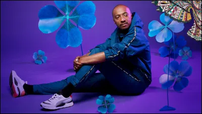 En quelle année le rappeur rejoint-il la troupe des Enfoirés ?