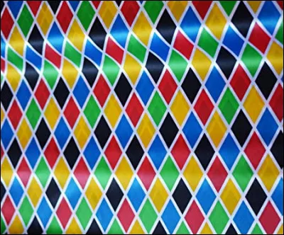 Harley Queen - Historiquement, de quelles couleurs est composée sa tenue ?