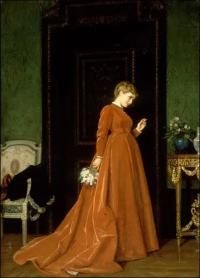 À qui doit cette femme devant une armoire ?