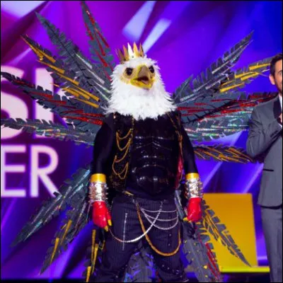 11e éliminé. Qui était sous le masque de l'aigle ?