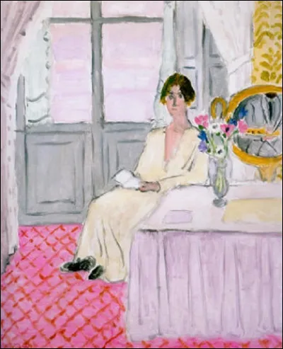 Qui a représenté cette "Femme lisant devant une table et un bouquet" ?