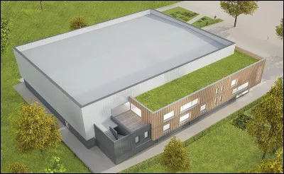 Dehors, ce b&acirc;timent abrite un terrain de volley, un mur d'escalade et un dojo. Ceci est un...