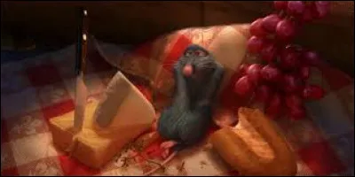 Dans le film "Ratatouille", quel fruit croqué avec du fromage fait exploser les papilles du rat Rémy ?