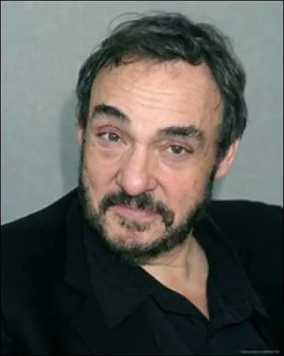 Qui John Rhys-Davies joue-t-il ?