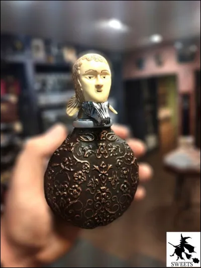 Que contient la flasque d'Alastor Maugrey alias Fol Oeil ?