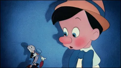 Allons faire un tour du côté de chez Pinocchio. Son père Geppetto a un petit chat noir et blanc qui s'appelle...