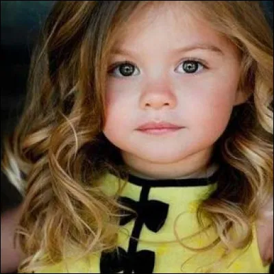 Quel est l'adjectif attribut de la phrase : "Elle était toute petite mais j'aimais ça" ?