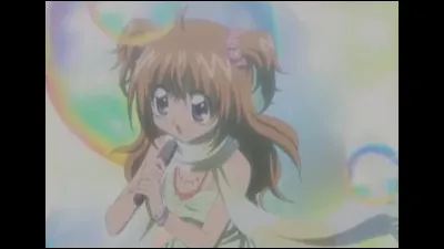 Quels mots apparaissent dans sa chanson "Arc en ciel de l'amour"?