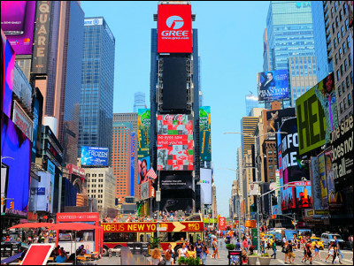 Comment s'appelle le quartier de New York situé dans l'arrondissement de Manhattan ?