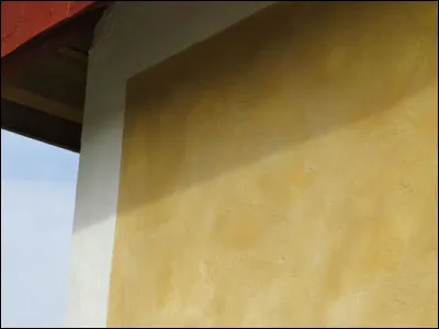 Le badigeon de chaux, appliqué sur des murs du bâti ancien, est...