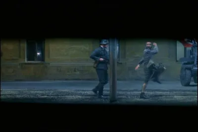 Pourquoi Guido se fait-il exécuter par un soldat dans une cachette pour pas effrayer son fils ?