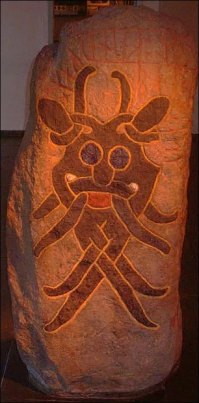 On a trouvé cette stèle funéraire runique près d'Aarhus, au Danemark : comment l'appelle-t-on et de quelque minéral est-elle faite ?