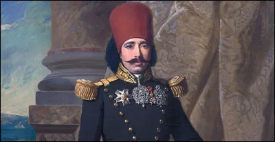 Quel homme politique tunisien d'origine grecque est nommé président du Grand Conseil consultatif en 1862 ?