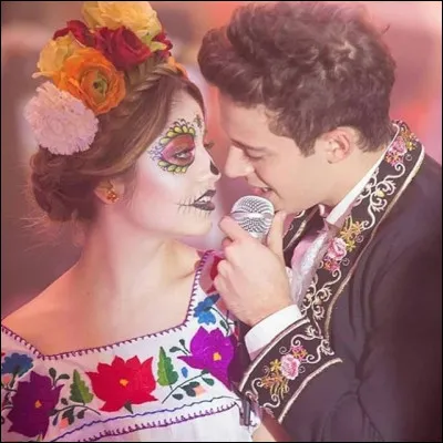 Quel est le titre de la chanson qu'a composée Simon pour la fête des morts ?