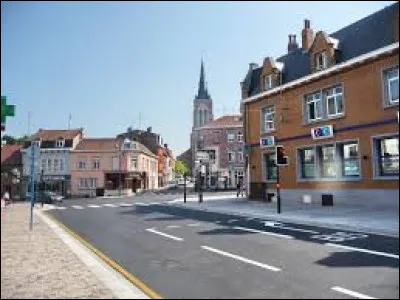 Ville de 20 000 habitants du département du Nord, bordée par le Lys et par la frontière belge :