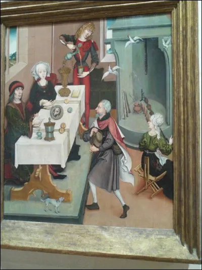 Avec le musée Unterlinden, te voilà de retour en Europe. Avant de continuer, viens manger avec les convives du tableau en photo. Attention, le repas est en train de s'envoler ! Qu'est-ce qui était prévu au menu ?