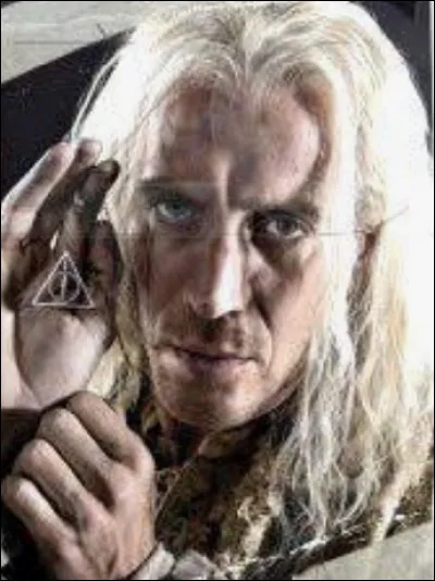 Qui a attaqué Mr. Lovegood au mariage de Bill et Fleur ?