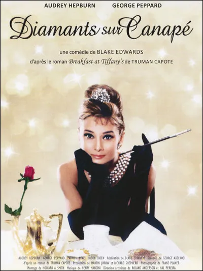 Quelle ballade est interprétée par Audrey Hepburn pour le film "Diamants sur canapé" en 1958 ?