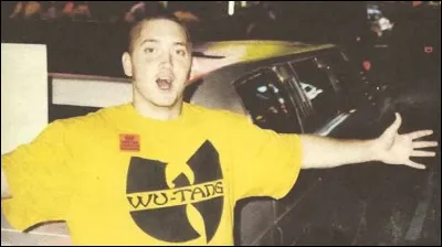 Quel est le titre de son premier album solo, celui sorti avant sa rencontre avec Dr. Dre ?