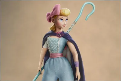 Quel est le nom de cette femme, douce en apparence, mais qui peut se montrer autoritaire envers son mouton à trois têtes ?