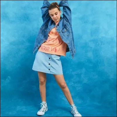 Avec quelle marque de chaussures collabore Millie ?