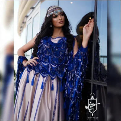 A quel styliste appartient cette création ?