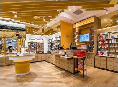 Dans quelles grandes villes les premières boutiques L'Occitane ont ouvert, en 1996 et 1997 ?