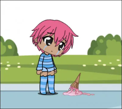 Le petit garçon fait tomber sa glace :