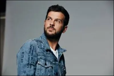 Complétez le titre de cette chanson : "Prendre un enfant par...