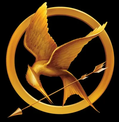 Katniss trouve la broche du geai moqueur dans un marché du district 12 qui appartenait à Sae Boui-Boui dans le(s) ...