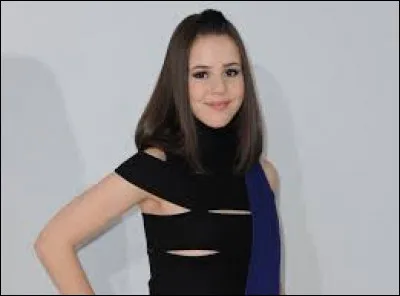 En quelle langue a-t-elle décidé de chanter ses chansons ?