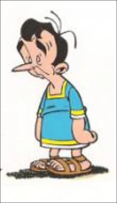 Comment se prénomme ce Romain qui est chargé d'accompagner ces Gaulois lors de leurs épreuves ?