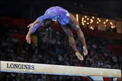 Quelle gymnaste réunionnaise inventa une figure gymnique à la poutre ? (vrille complète en position transversale enchaînée sur un tour d'appui)