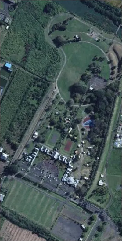 Nous prenons ensuite le chemin pour ce parc grandiose. Il se nomme "le parc du Colosse". De quel quartier de la ville de Saint-André fait-il partie ?